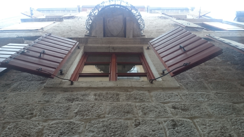 Family Crest  (East Wing, Under the Balcony)